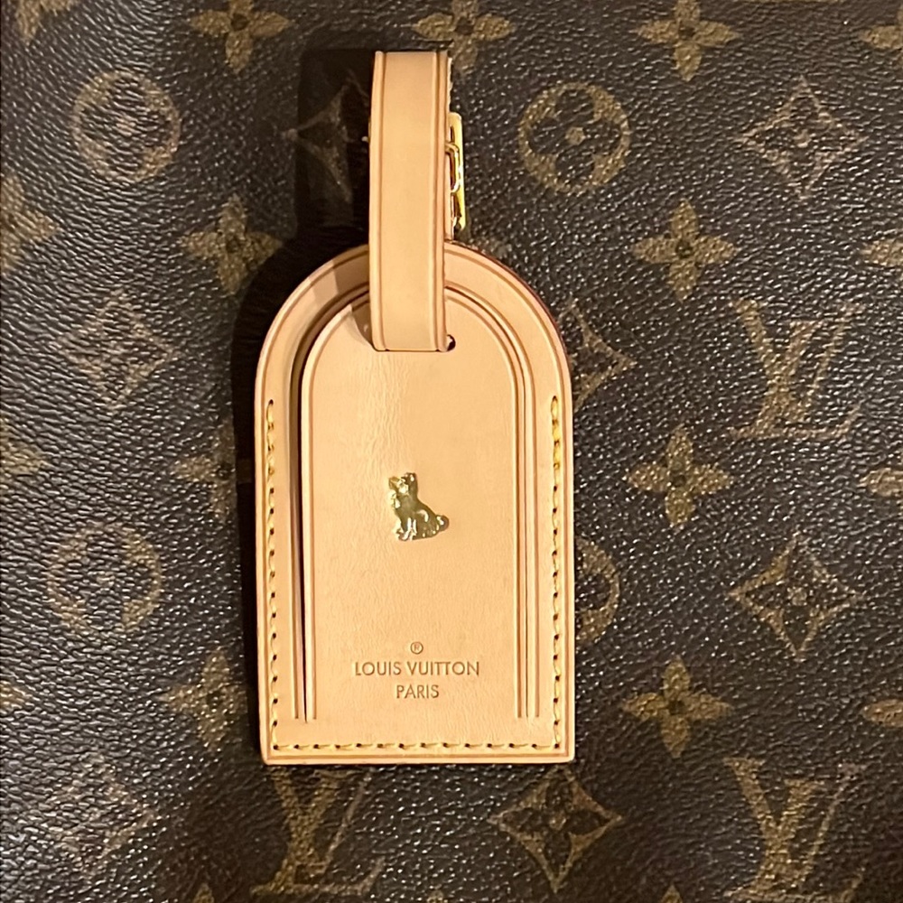 100% Authentic Louis Vuitton Luggage
Tag with Year of the Dog Hot Stamp